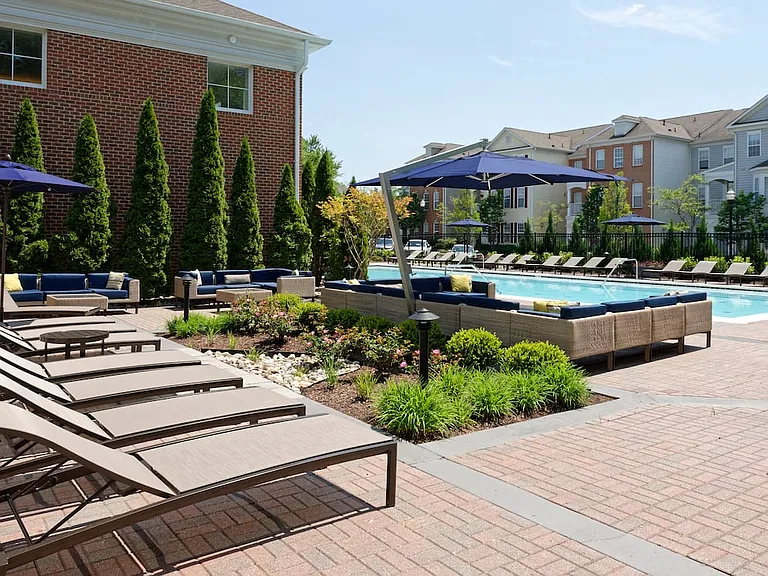 Pool and sundeck with lounge seating