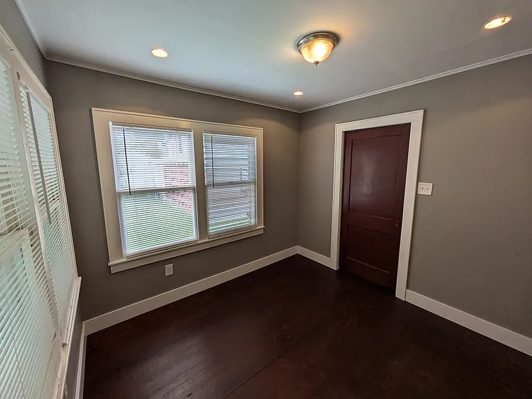 Breakfast room is bright with lots of windows & recessed lighting. Can also be used as dining room or home office.
