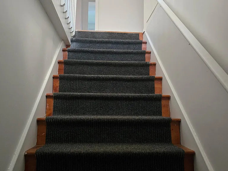 Stairs Within Unit Going Up To Second Floor.