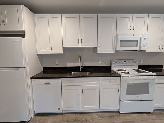 Brand new high efficiency appliances included (refrigerator, stove/oven, dishwasher, microwave)