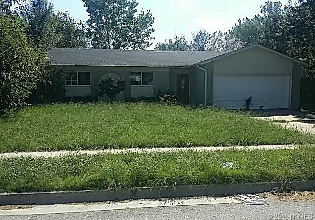 1st image of 10888 E 33rd Ct