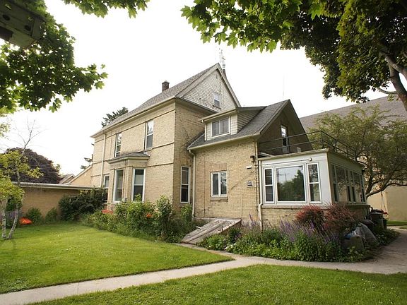 Back Exterior with Sun Porch