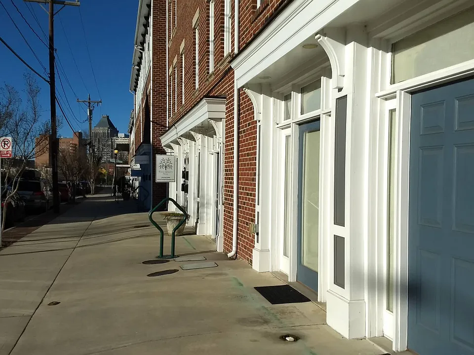 high walkability--stores, cafes, restaurants and studios a few steps away, 1 block off of downtown S. Elm St.