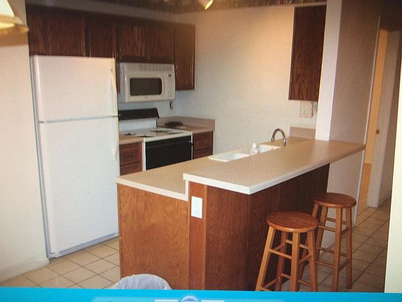 Kitchen with new Dishwasher and microwave.