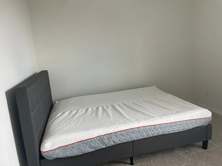 Room with bed and computer table