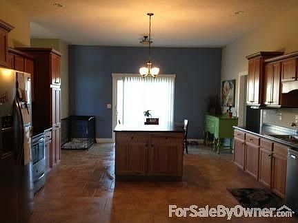 Kitchen
						:
						Huge open kitchen. Great for gatherings!