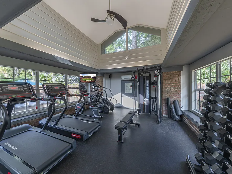 Fitness center with cardio and strength training equipment