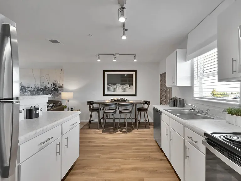 Welcome to Esperanza at Wild Orchid, where modern living meets elegant design. This spacious kitchen features sleek finishes and ample natural light, perfect for creating culinary delights. Schedule your tour today and see it for yourself!