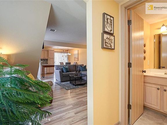 Newly tiled half bath and lighting