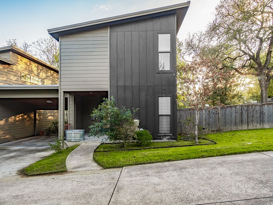 Front of house with carport