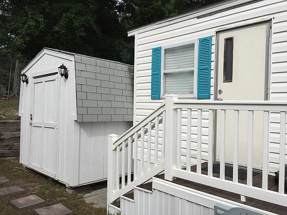 Storage building included on property!