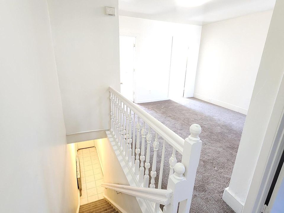 Stairway and Living Room. New carpet (Feb 2024)