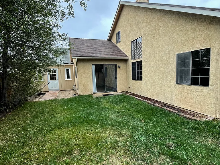 Backyard with Slider to Primary Bedroom