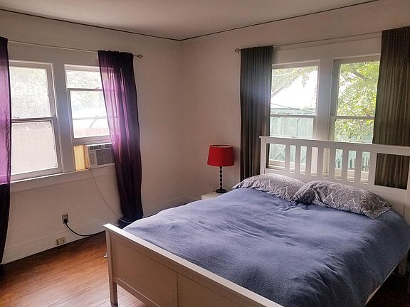 Ground floor bedroom, north and east windows