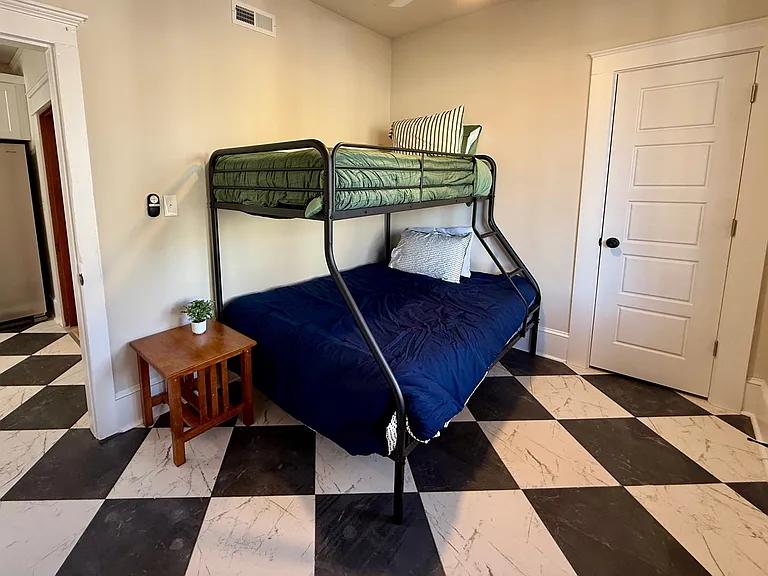 Main level back bedroom