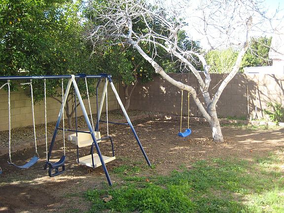 Landscaped backyard with watering system