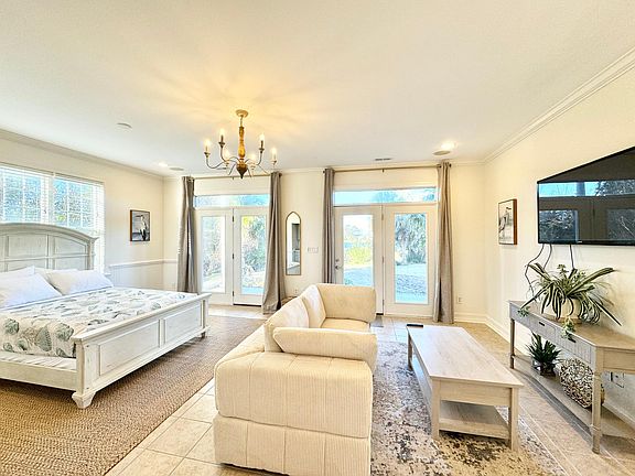 Lots of Windows and Natural Light. Coffee Table doubles as a desk with lift up feature.