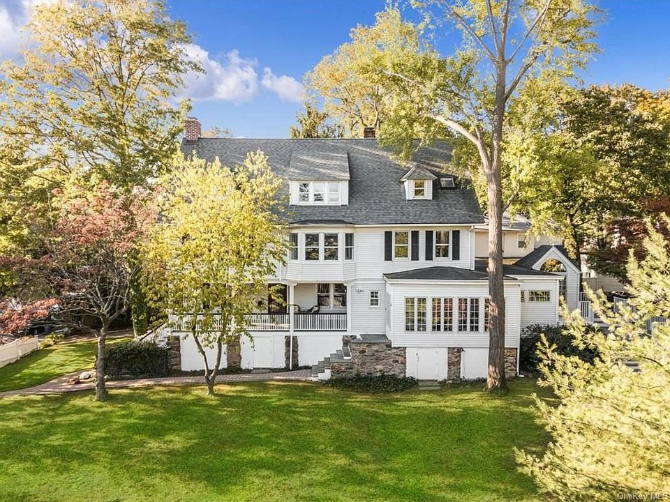 57 is located in front (left side) of house. 55 is the back and owner occupied.