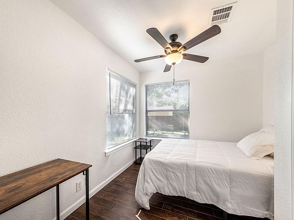 Ceiling fan to stay cool and desk included