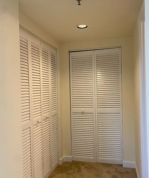 Dressing area next to the bathroom in the primary bedroom.