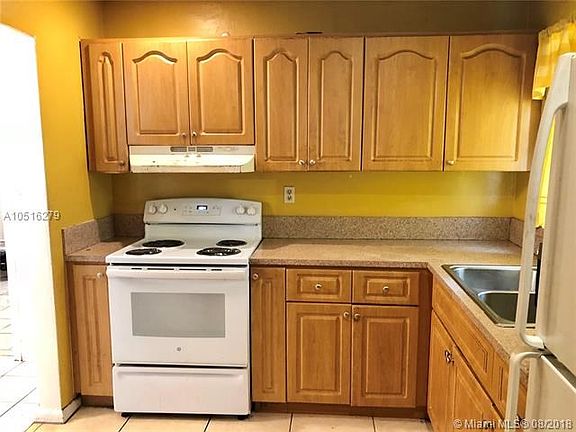 Lots of cabinets in kitchen