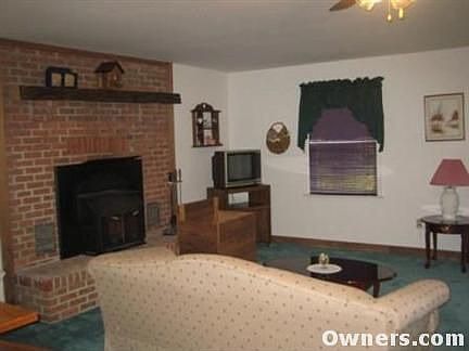 Warm and Inviting Brick Fireplace w/ Insert