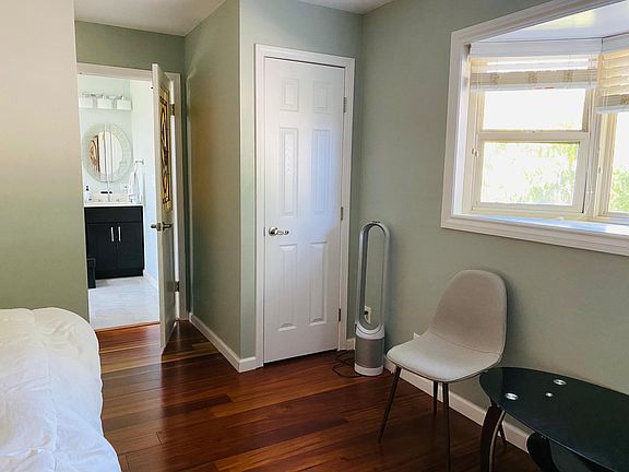 master bedroom with two walk-in closets
