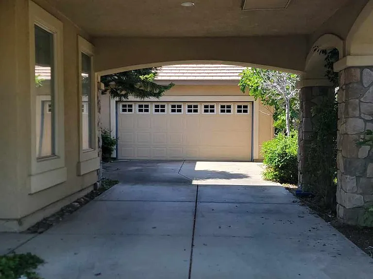 long driveway can easily fit up to 3 car lengths - good for kids to play off street