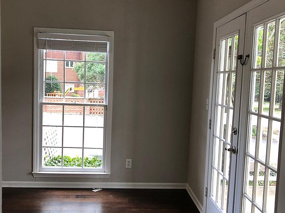 corner of living room and french doors out to covered porch