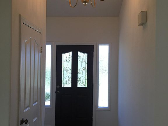 Front door entry with guest coat closet