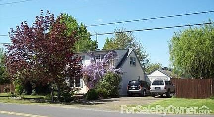 Street View looking South West
						:
						The front of house is facing East for reference. Plenty of off street parking.