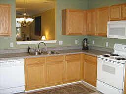 spacious kitchen with sliding doors to balcony 