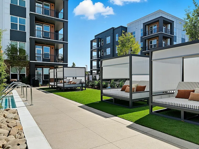 Relax poolside in the shade on the cozy cabanas