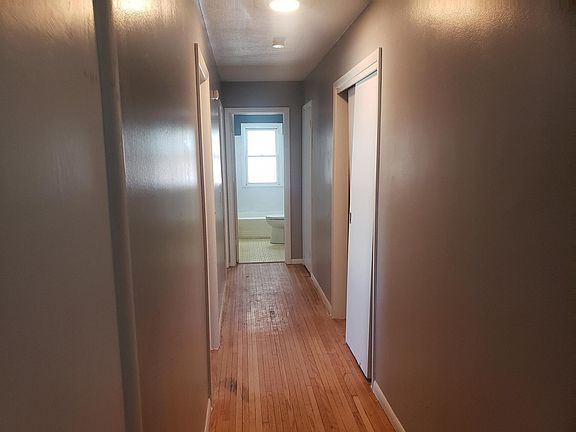 Hallway to bedrooms and bathroom.