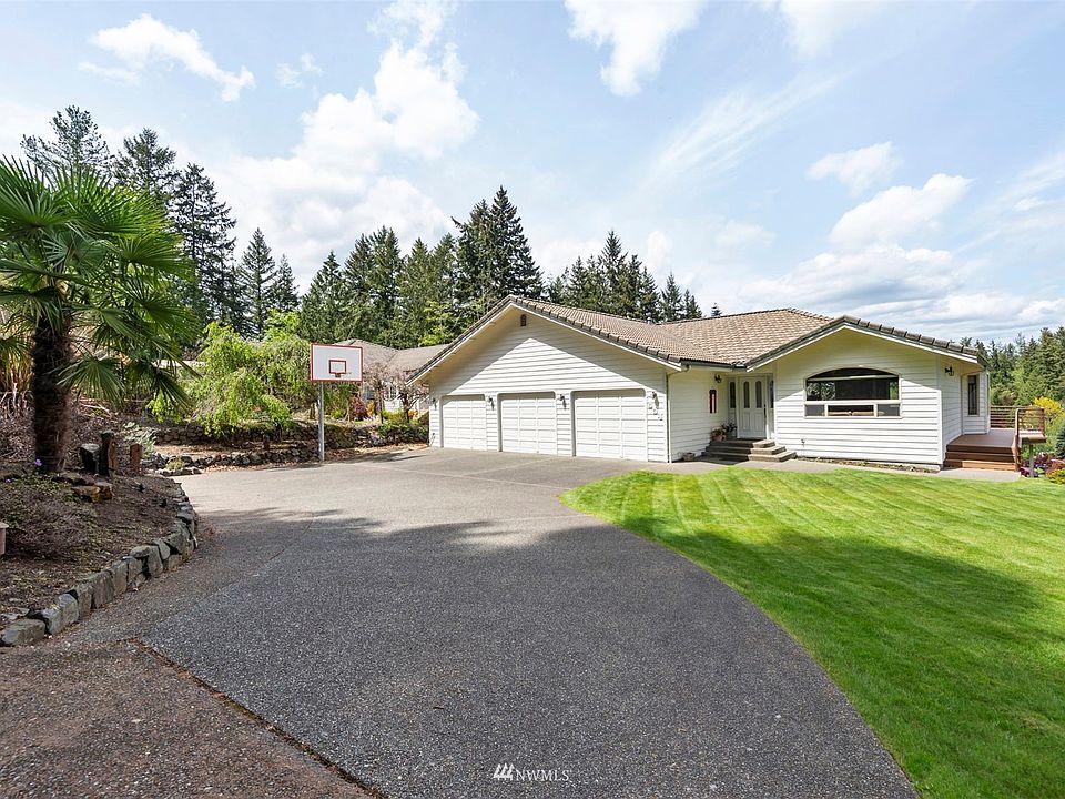 Garage doors are 9Ft Tall. The depth of the garage is split in half, one side is 24Ft and 30Ft deep on the other.  Plumbed sink also.