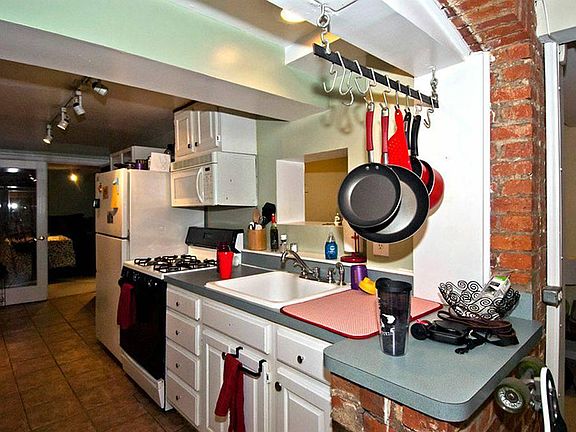 From Entryway into kitchen