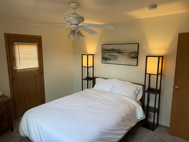 Bedroom #2: Queen new mattress, lamps with charging stations, dresser, blackout drapes
