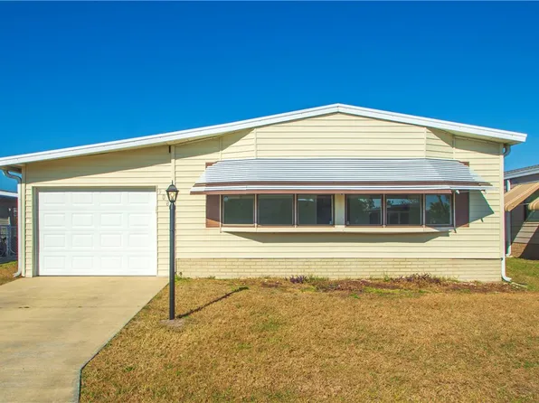 908 Oleander Cir, Barefoot Bay, FL 32976