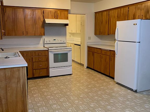 Kitchen looking into laundry room