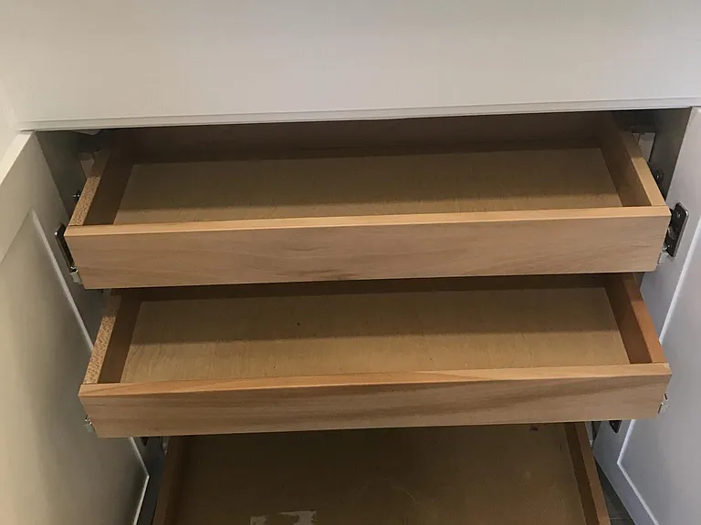 Master bedroom underneath sink cabinet with custom pull out