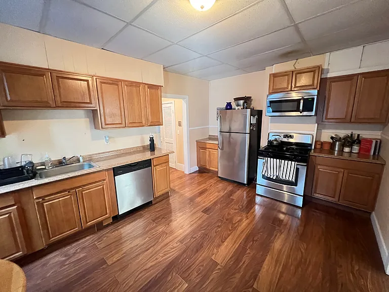 Kitchen will be renovated with new counter tops, sink, and faucet. Drop ceilings will be removed and recessed lights will be added. Cabinets will have brand new hardware. All surfaces will be freshly painted.