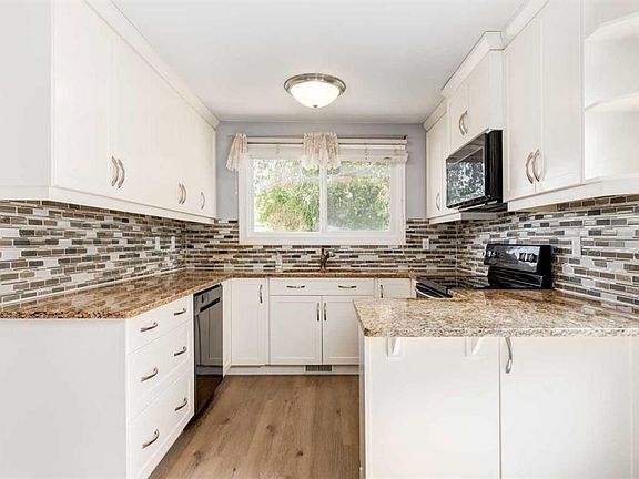 4th image of 71 E Rivervalley Cres SE