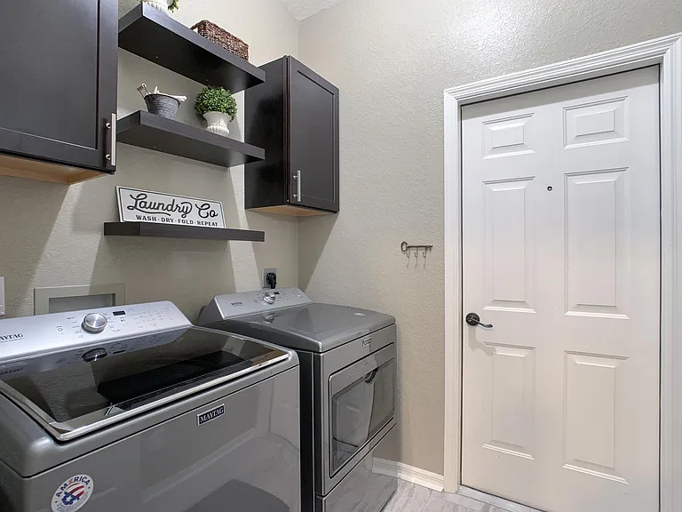 Laundry room and door to garage