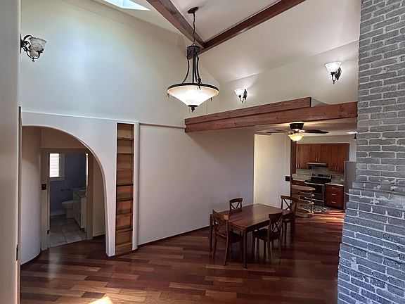 View of dining area and hallway bath.