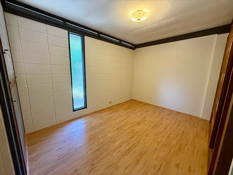 Bedroom 1 with new flooring.