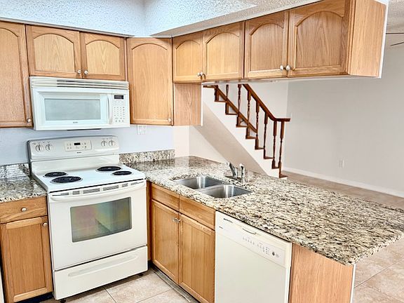 Kitchen with Granite Counter.