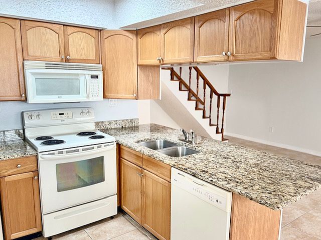Kitchen with Granite Counter.