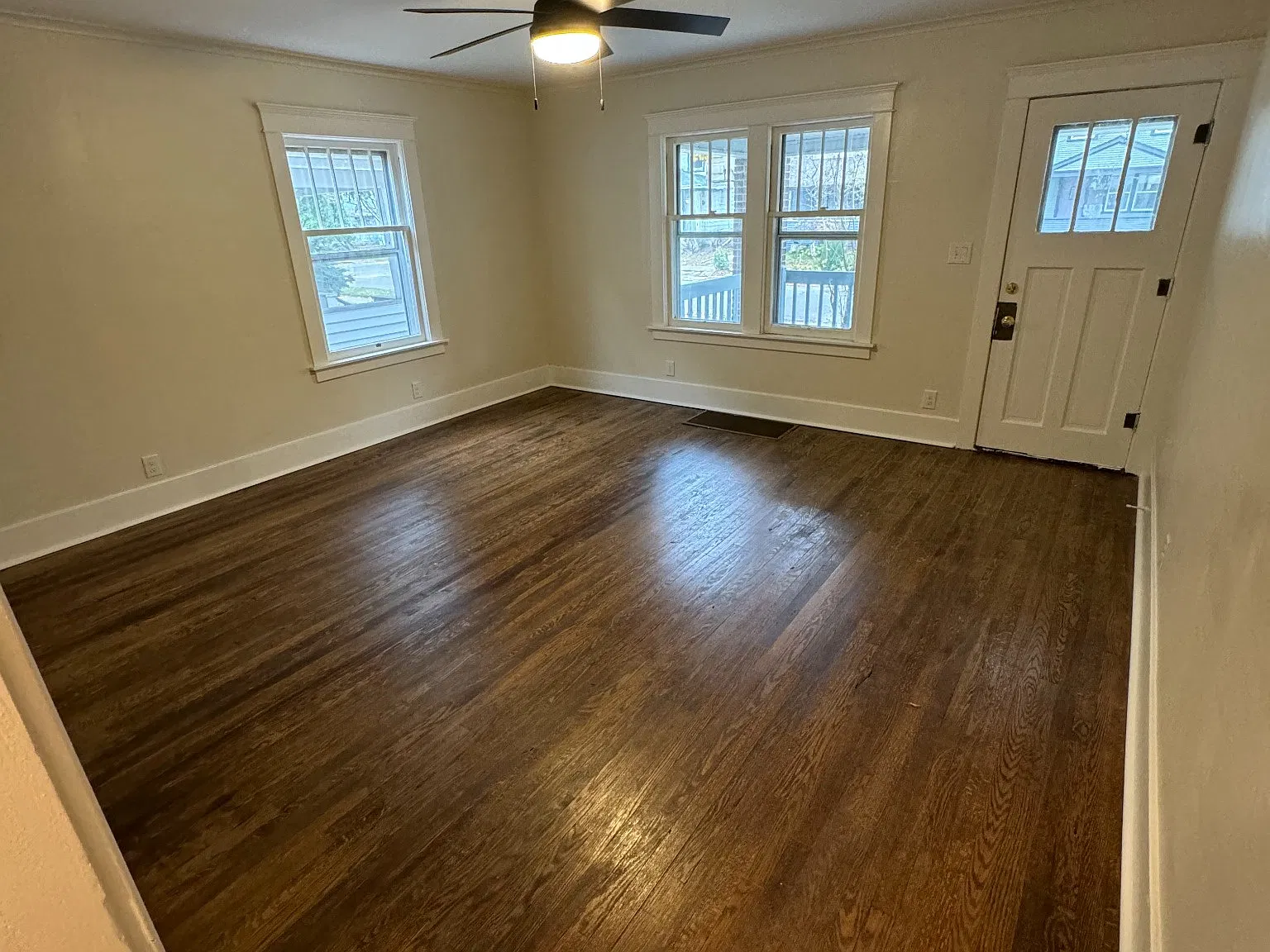 Living room with front entry door