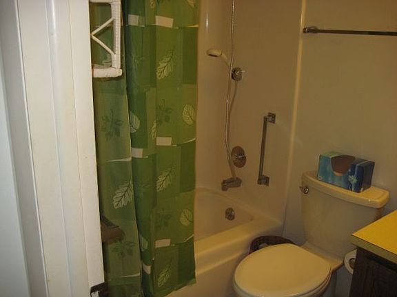BATH HAS TUB COMBO SHOWER