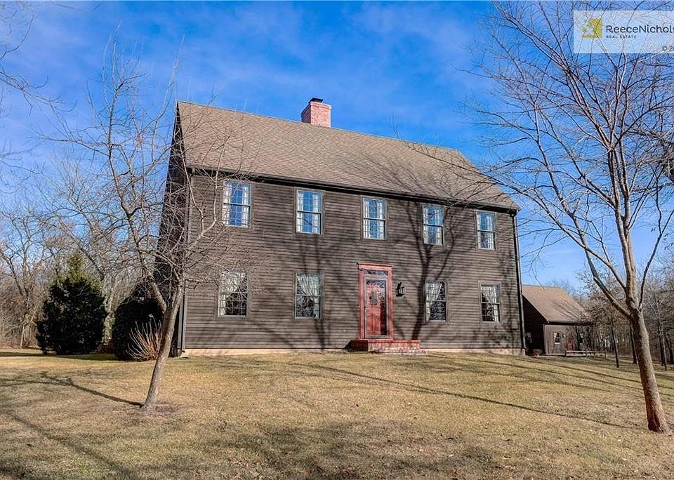 Custom built authentic Saltbox sitting on 5.25 acres. Lap cedar siding with traditional dark stain, paned windows and custom front door.